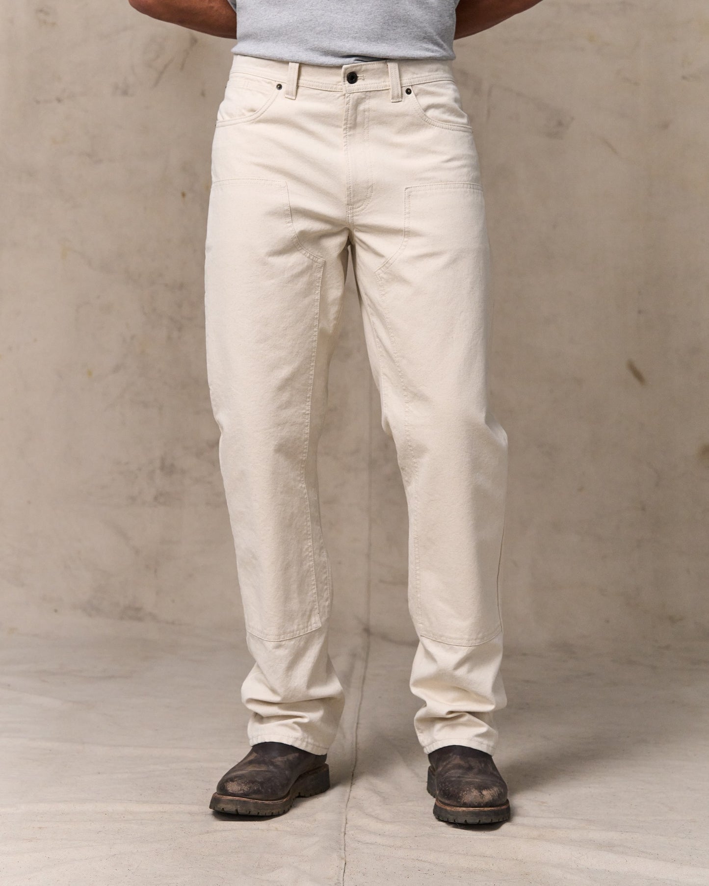 image of a model wearing Filson's Dry Tin Double Front Pants - Natural Seed|Model is 6'2" wearing a size 34x32