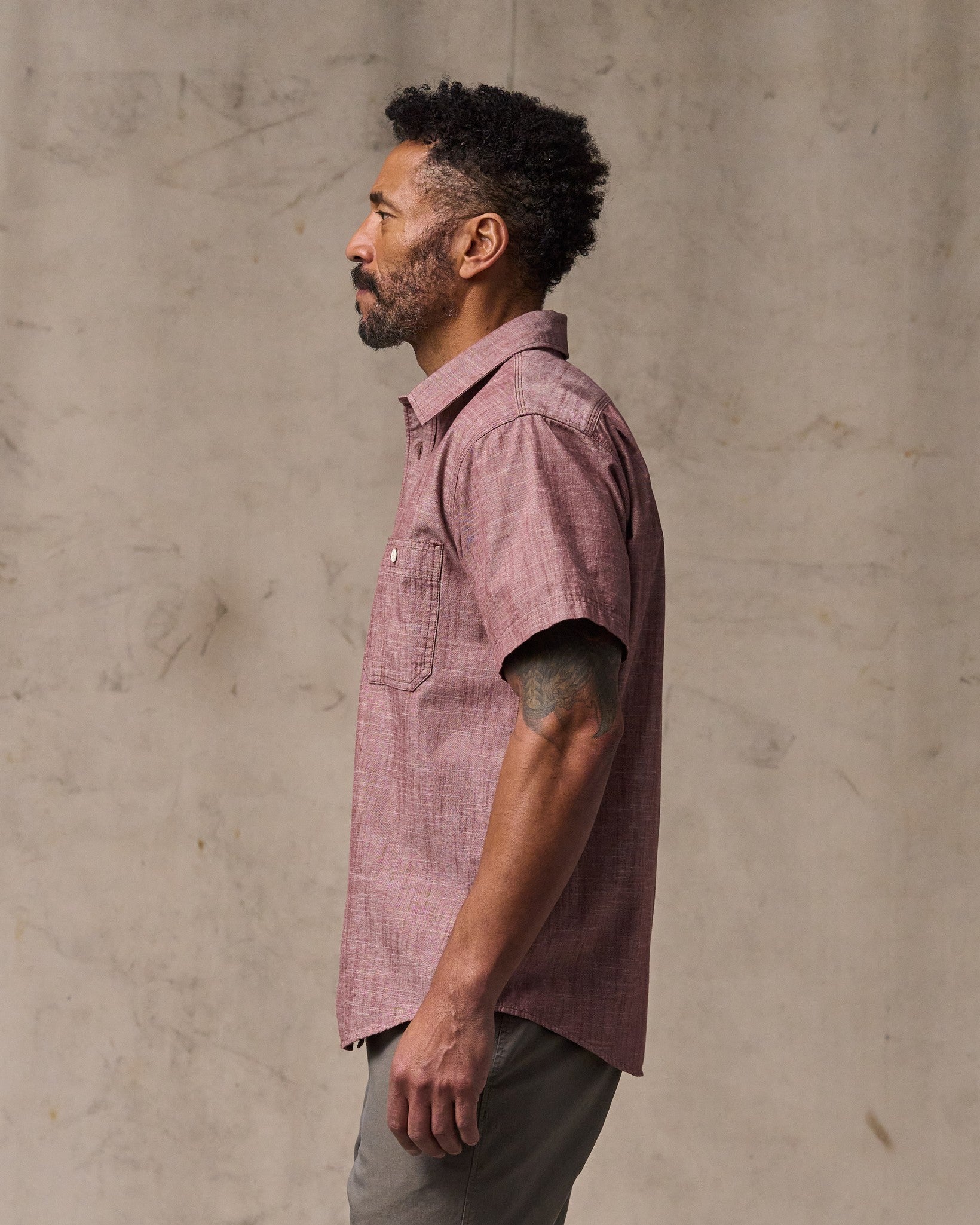 image of a model wearing Filson's Short Sleeve Chambray Shirt  - Sable