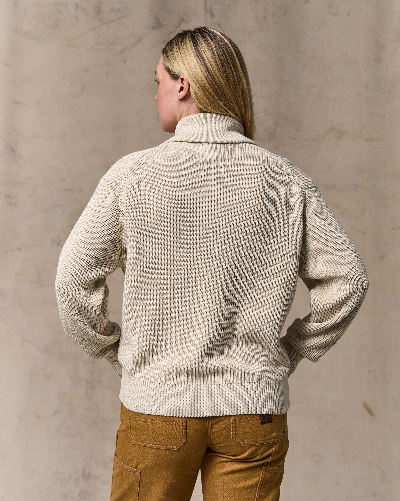 image of a model wearing Filson's Women's Cotton Shawl Neck Cardigan - Natural