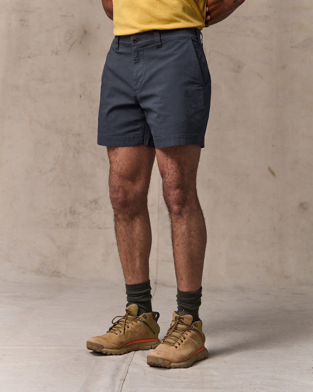 image of a model wearing Filson's Granite Mountain 6" Shorts - Ink Blue