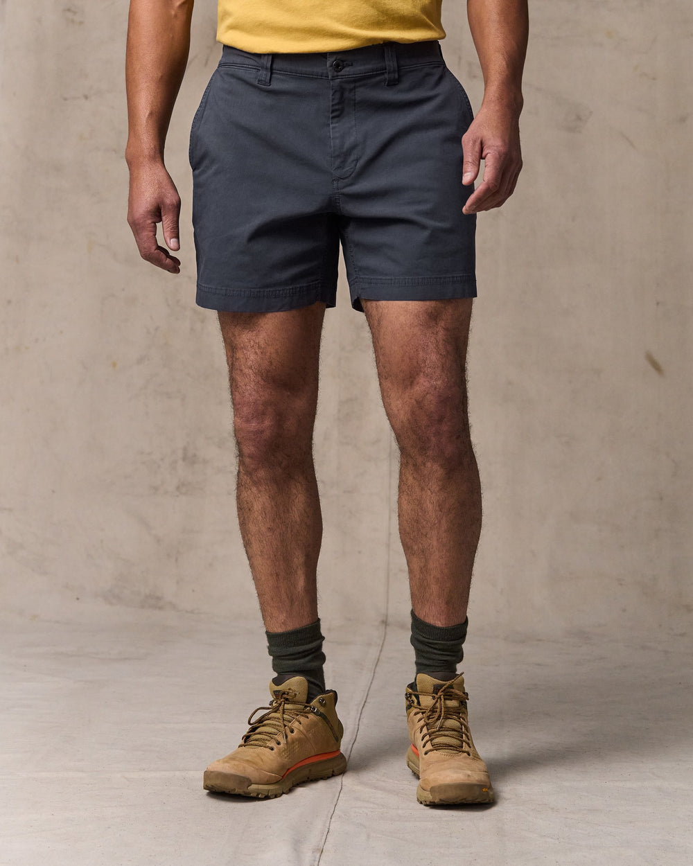 image of a model wearing Filson's Granite Mountain 6" Shorts - Ink Blue