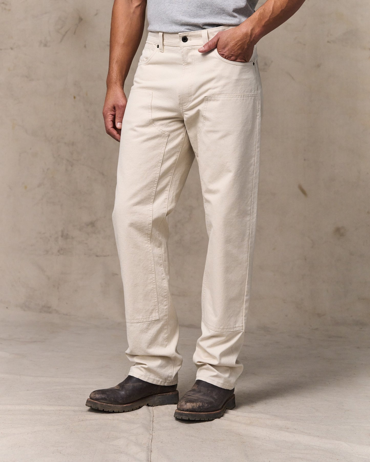 image of a model wearing Filson's Dry Tin Double Front Pants - Natural Seed