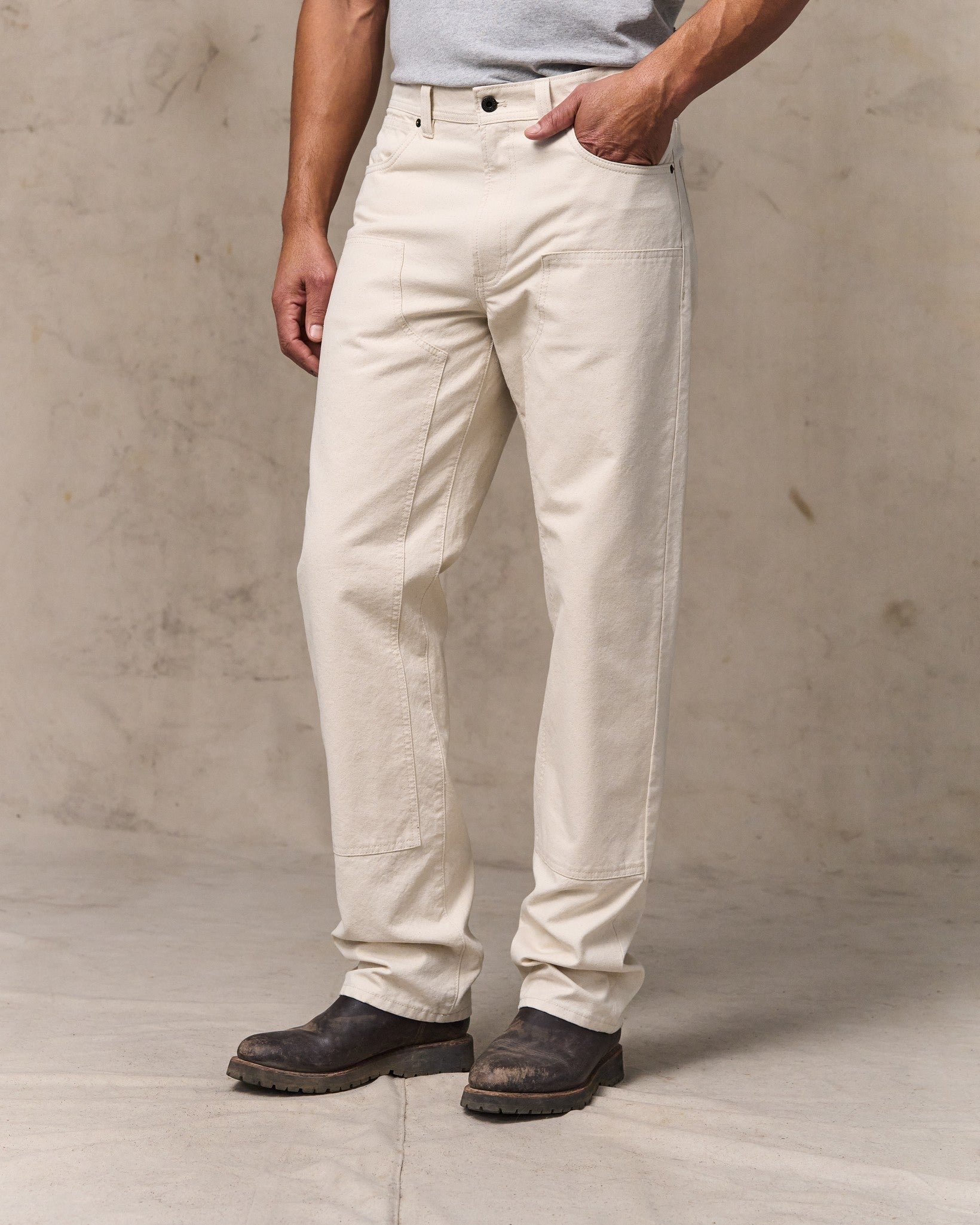 image of a model wearing Filson's Dry Tin Double Front Pants - Natural Seed