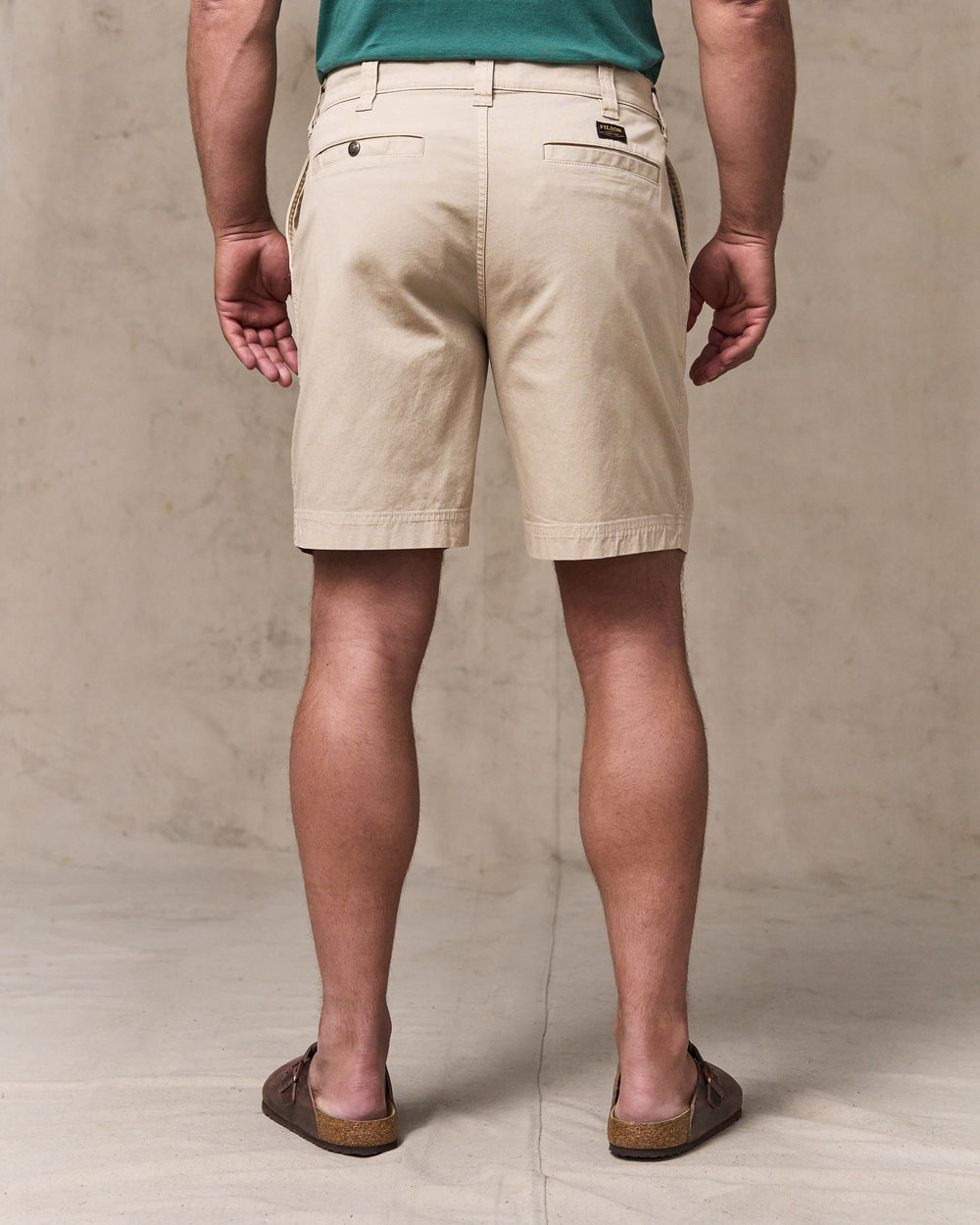 image of a model wearing Filson's Granite Mountain 9" Shorts - Buck Tan