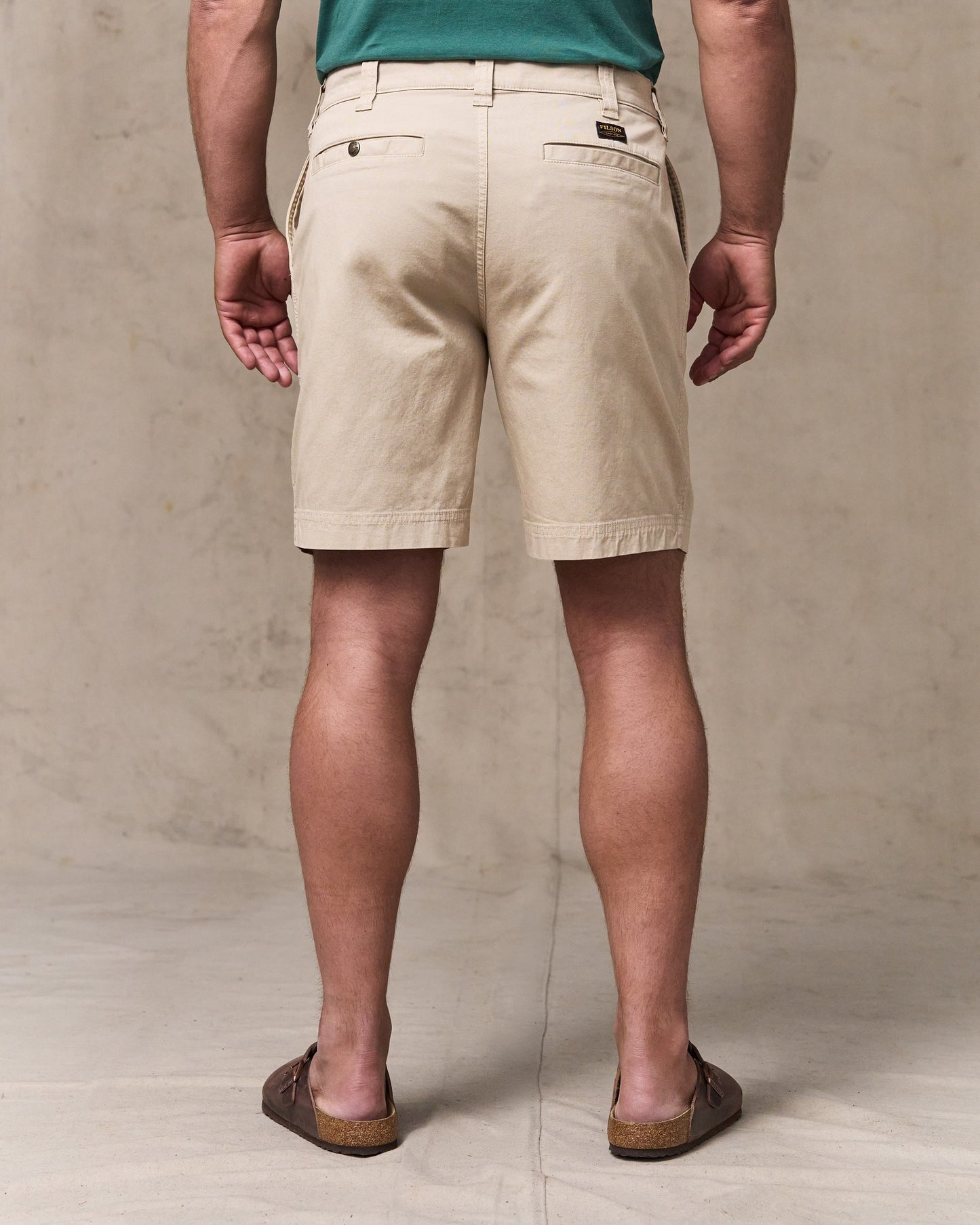 image of a model wearing Filson's Granite Mountain 9" Shorts - Buck Tan