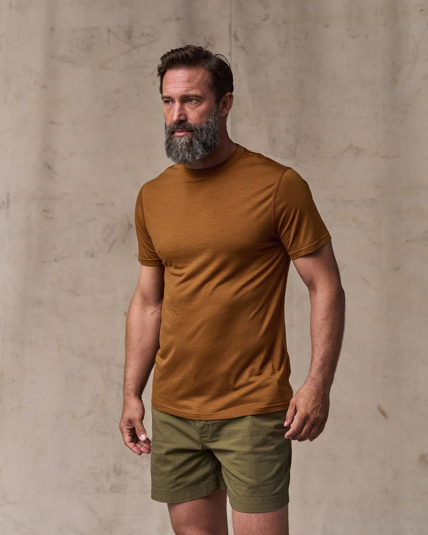 image of a model wearing Filson's Wool-blend Upf T-shirt - Whiskey|Model is 6'1" wearing a size medium
