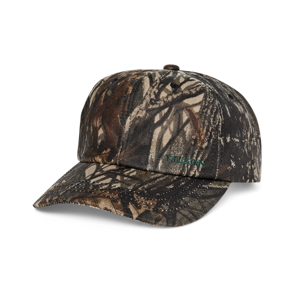 Front-facing image of the Filson Oil Tin Low-profile Logger Cap - Realtree Hardwoods Camo