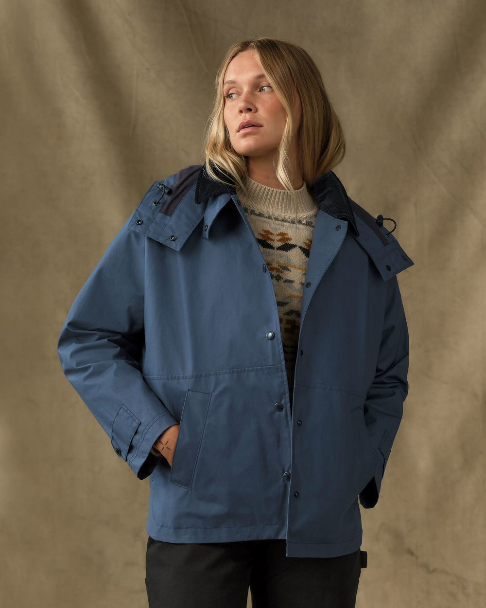 image of a model wearing Filson's Women's Harbor Front Waxed Jacket - Navy