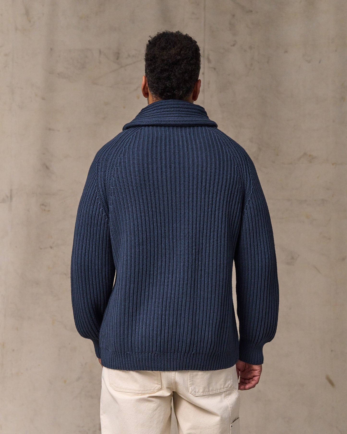image of a model wearing Filson's Fisherman Rib Cotton Cardigan - Navy