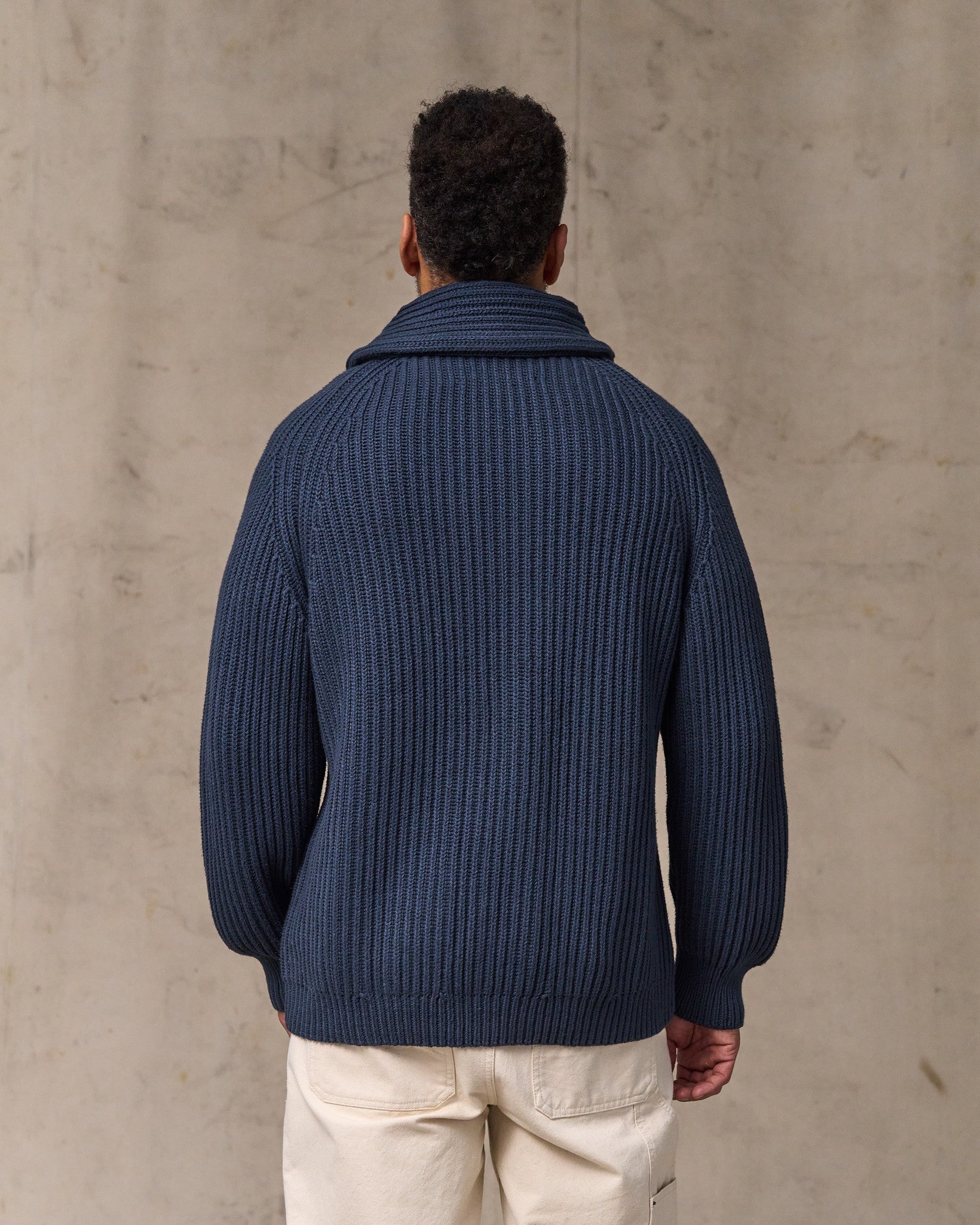 image of a model wearing Filson's Fisherman Rib Cotton Cardigan - Navy