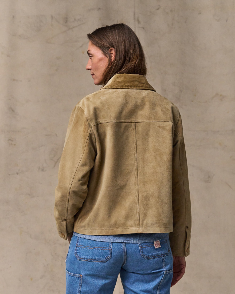 image of a model wearing Filson's Women's Short Suede Barn Jacket - Light Gray
