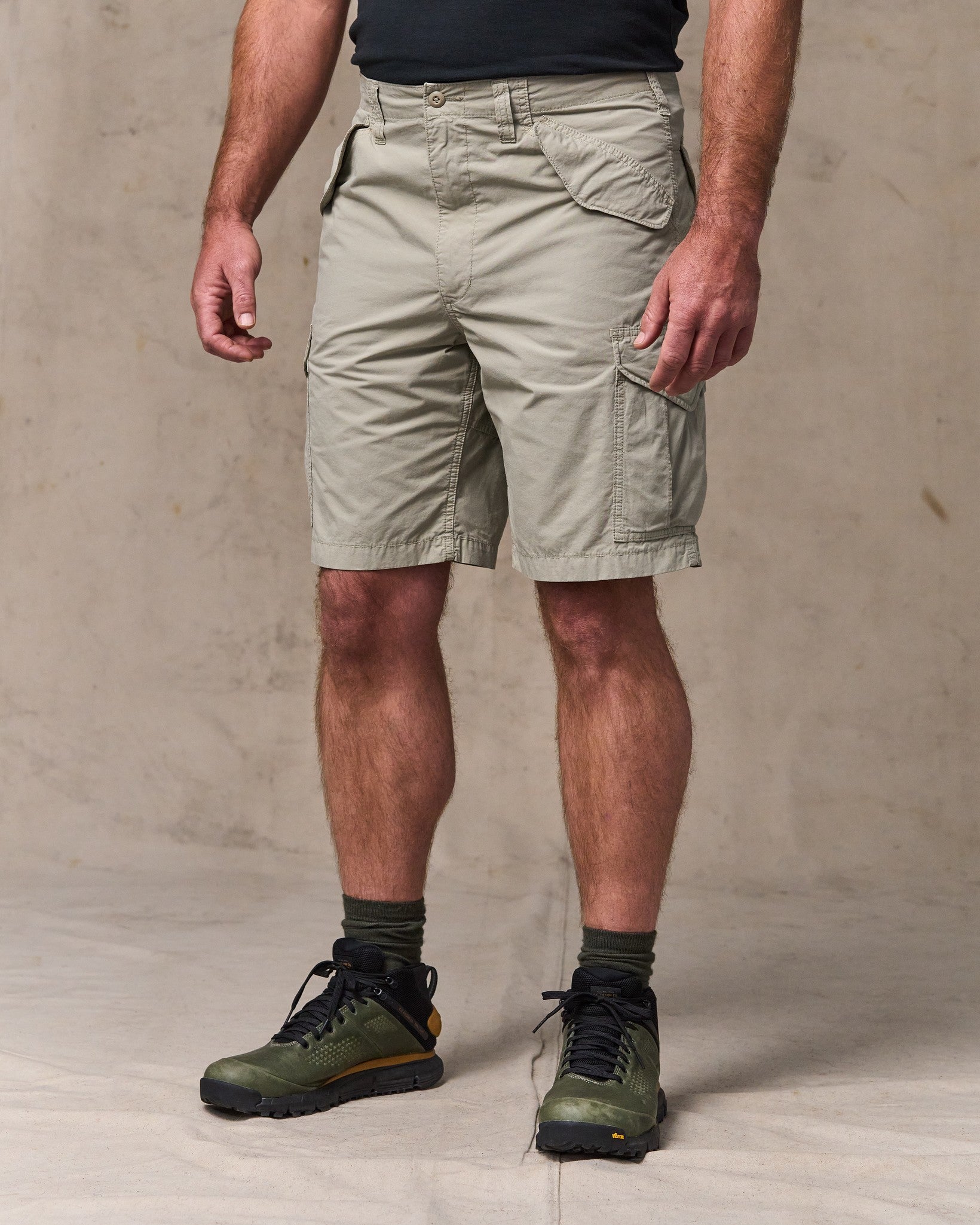 image of a model wearing Filson's Tropical Poplin Cargo Short - Dried Sage