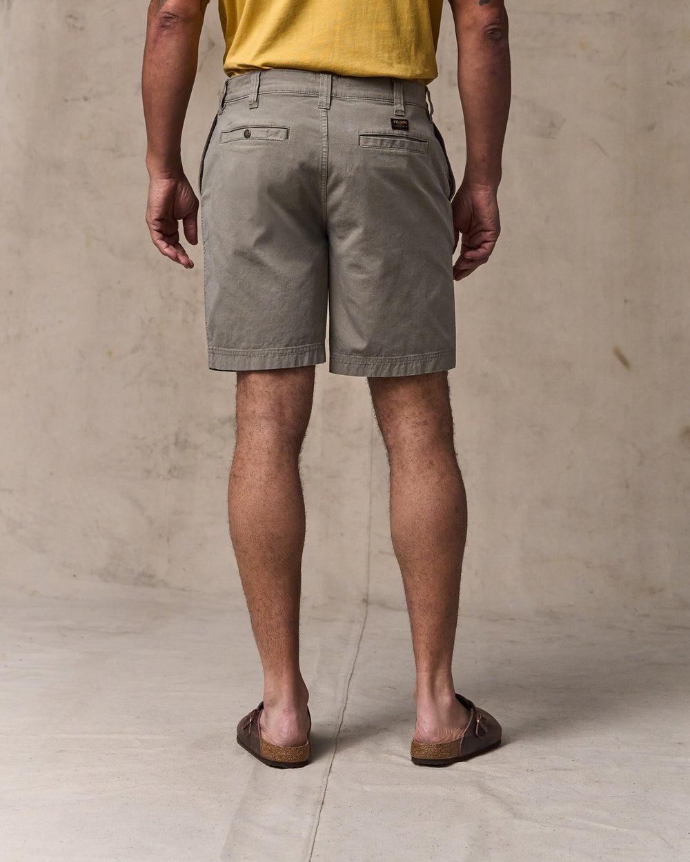 image of a model wearing Filson's Granite Mountain 9" Shorts - Hawk Brown