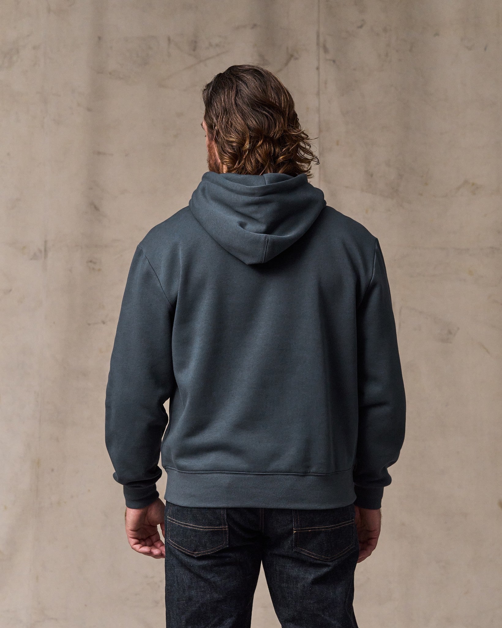image of a model wearing Filson's Northwest Hoodie - Ink Blue