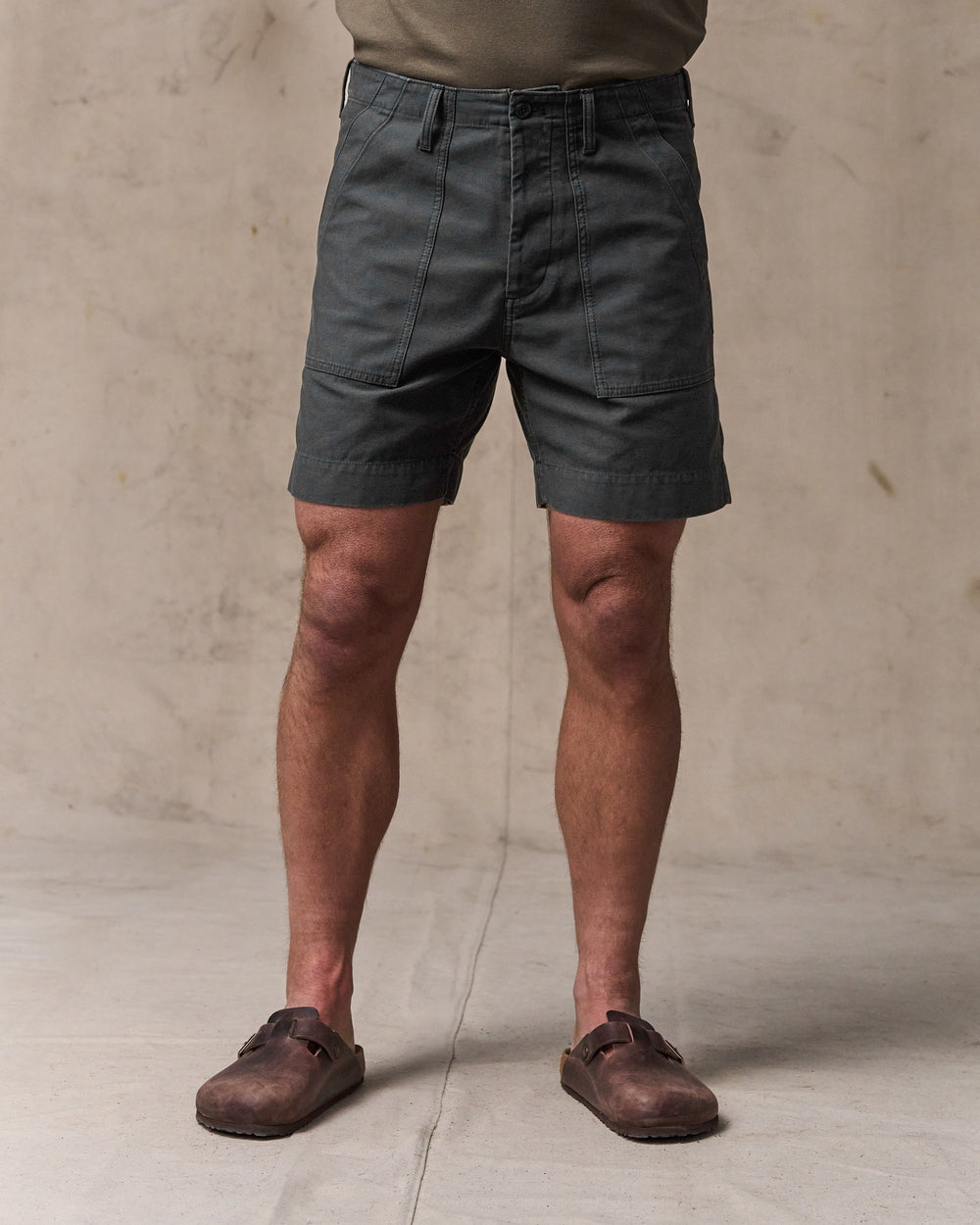 image of a model wearing Filson's Field Supply Shorts - Washed Faded Black