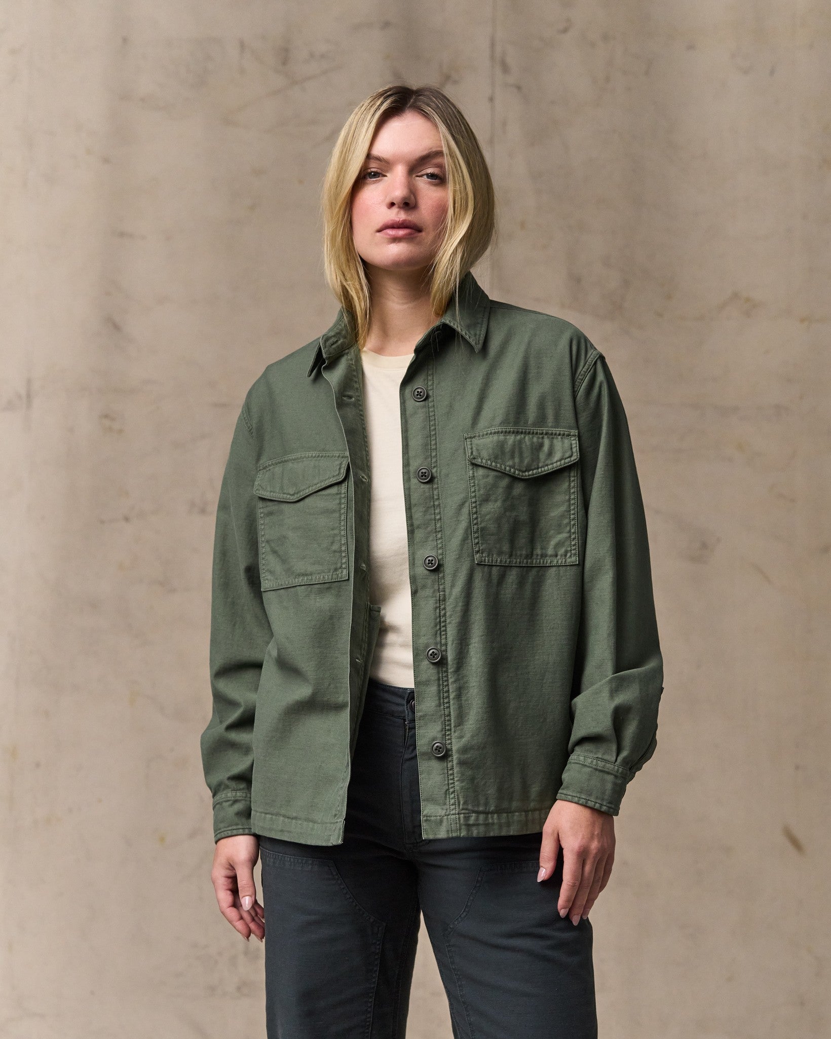 image of a model wearing Filson's Women's Reverse Sateen Jac-shirt - Service Green