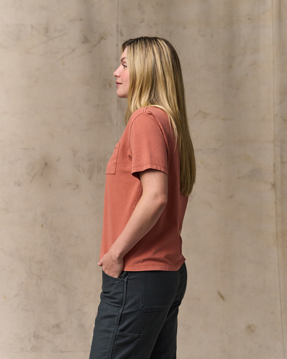 image of a model wearing Filson's Women's Short Sleeve Pocket Tee - Copper Brown