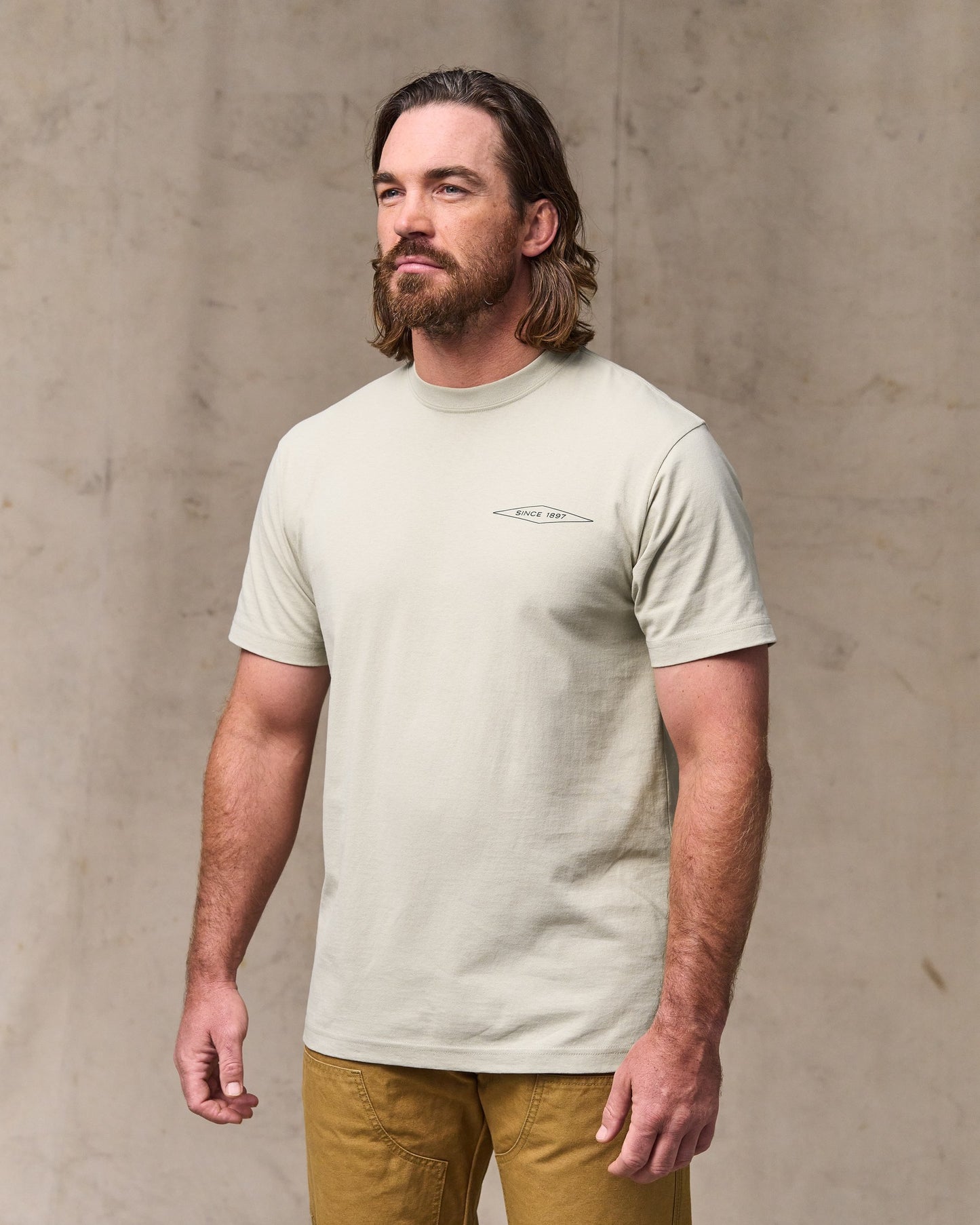 image of a model wearing Filson's Diamond Graphic T-shirt - Gray Sky|Model is 6'1" wearing a size medium