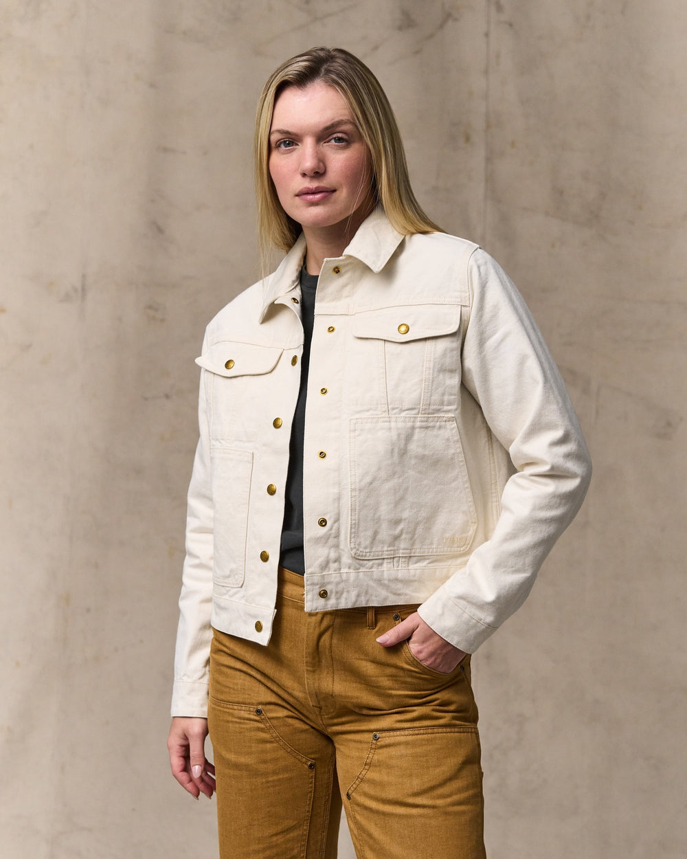 image of a model wearing Filson's Women's Canvas Short Cruiser Jacket - Natural Seed