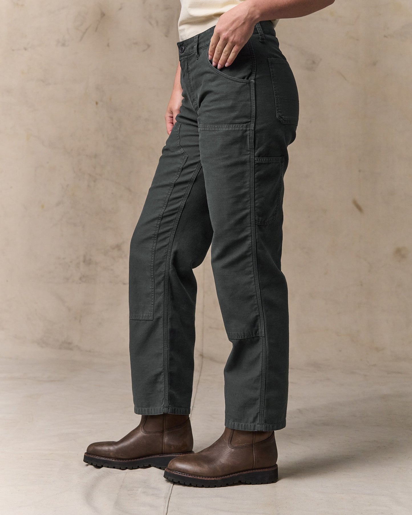 image of a model wearing Filson's Women's Reverse Sateen Double Front Pants - Faded Black
