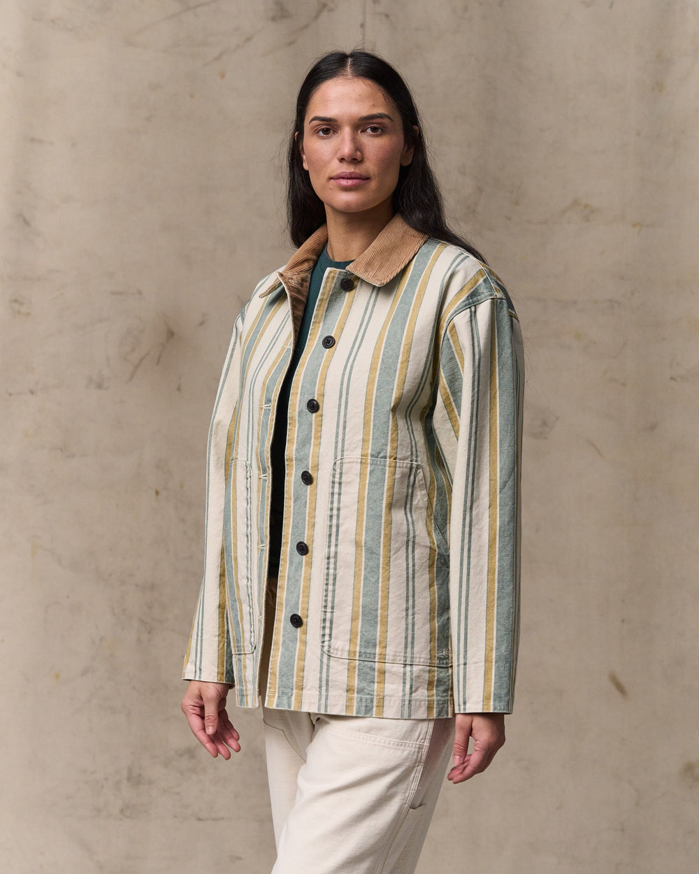 image of a model wearing Filson's Women's Canvas Barn Coat - Natural / Yellow