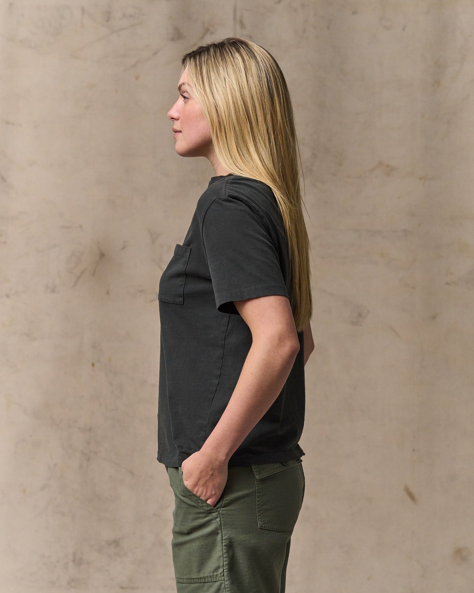 image of a model wearing Filson's Women's Short Sleeve Pocket Tee - Faded Black