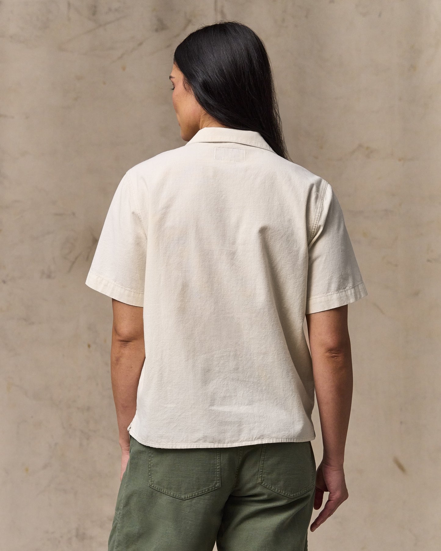 image of a model wearing Filson's Women's Camp Shirt - Natural Seed