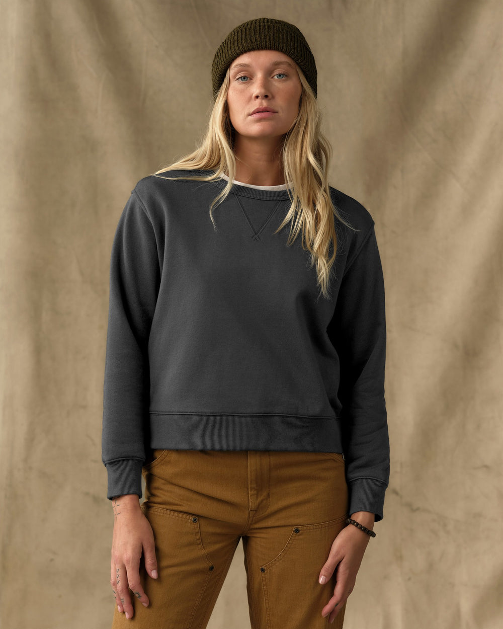 image of a model wearing Filson's Women's French Terry Crewneck - Faded Black