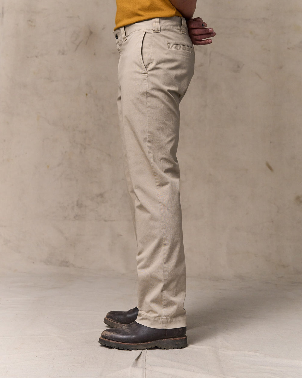 image of a model wearing Filson's Granite Mountain Flat Front Pants - Buck Tan