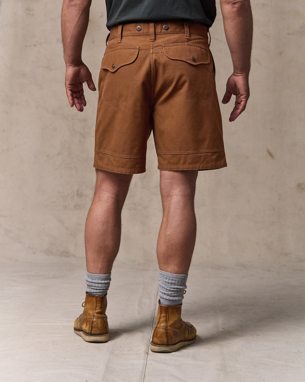 image of a model wearing Filson's Dry Tin Cloth Shorts  - Whiskey