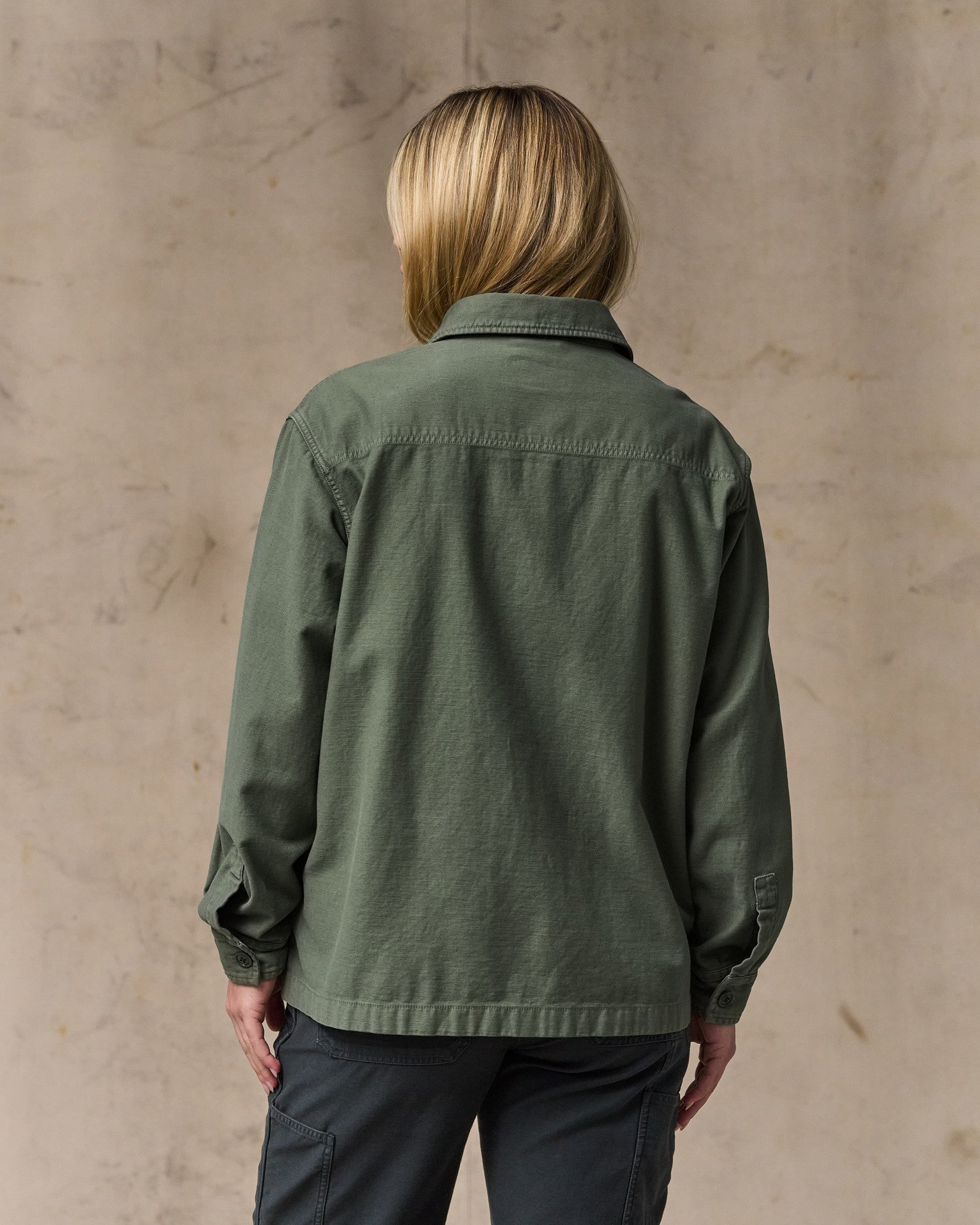 image of a model wearing Filson's Women's Reverse Sateen Jac-shirt - Service Green