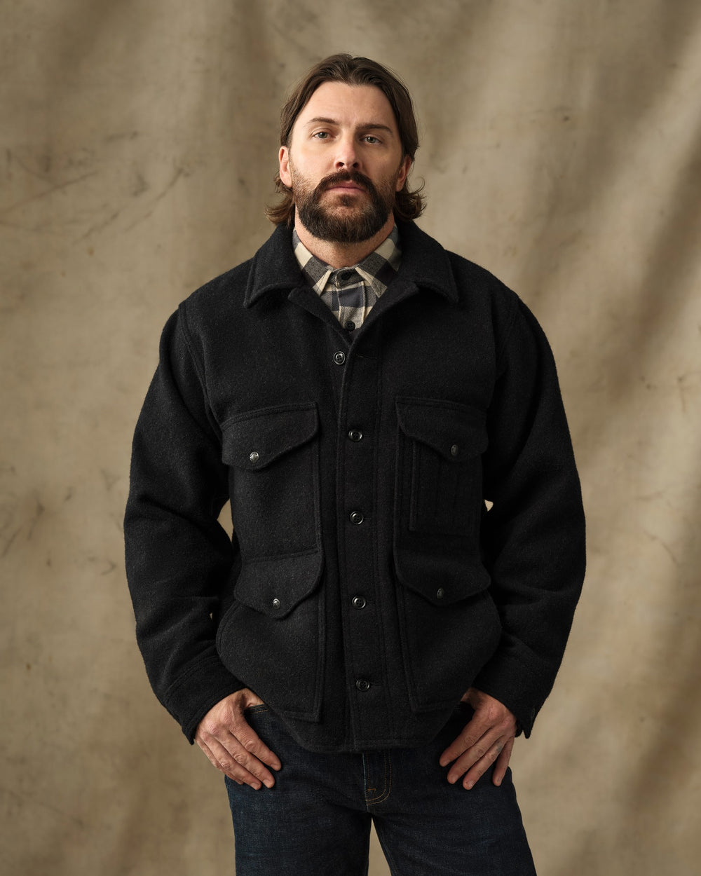 image of a model wearing Filson's Mackinaw Wool Cruiser Jacket - Charcoal