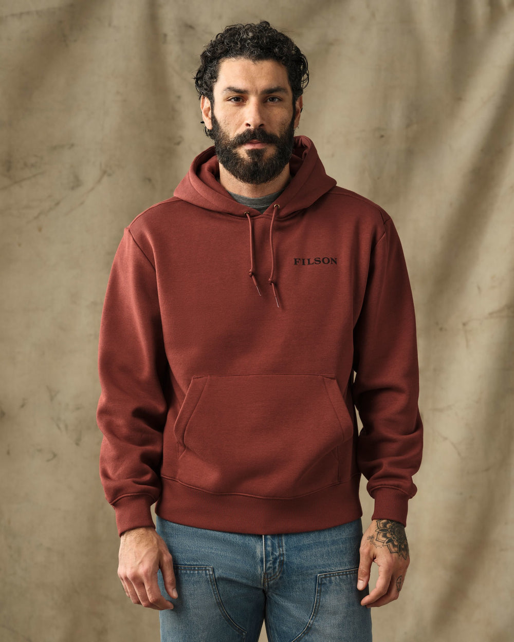 image of a model wearing Filson's Scenic Graphic Hoodie - Sequoia
