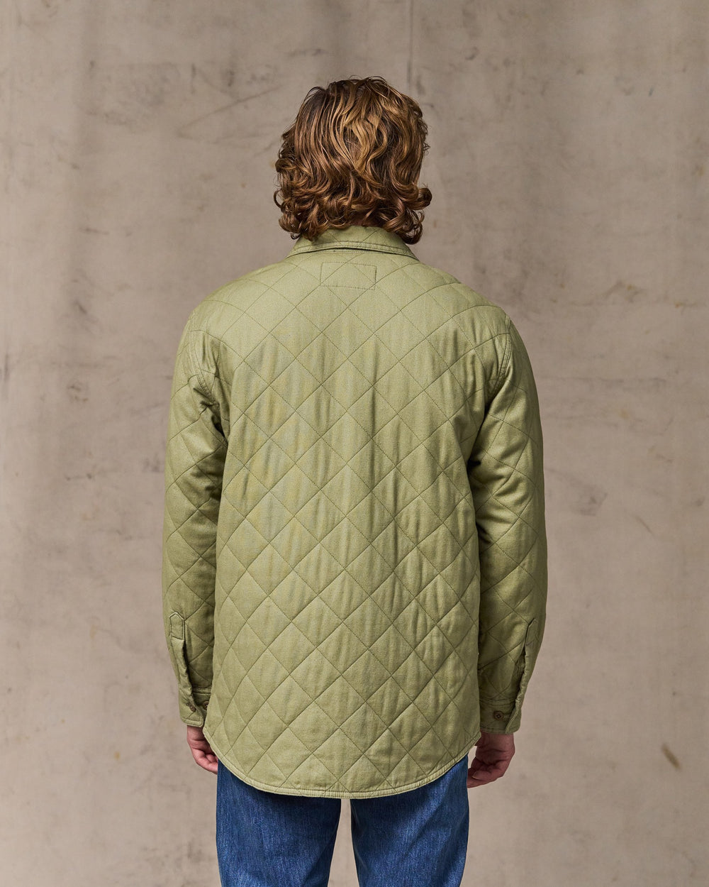 image of a model wearing Filson's Insulated Flannel Jac-shirt - Lakebed