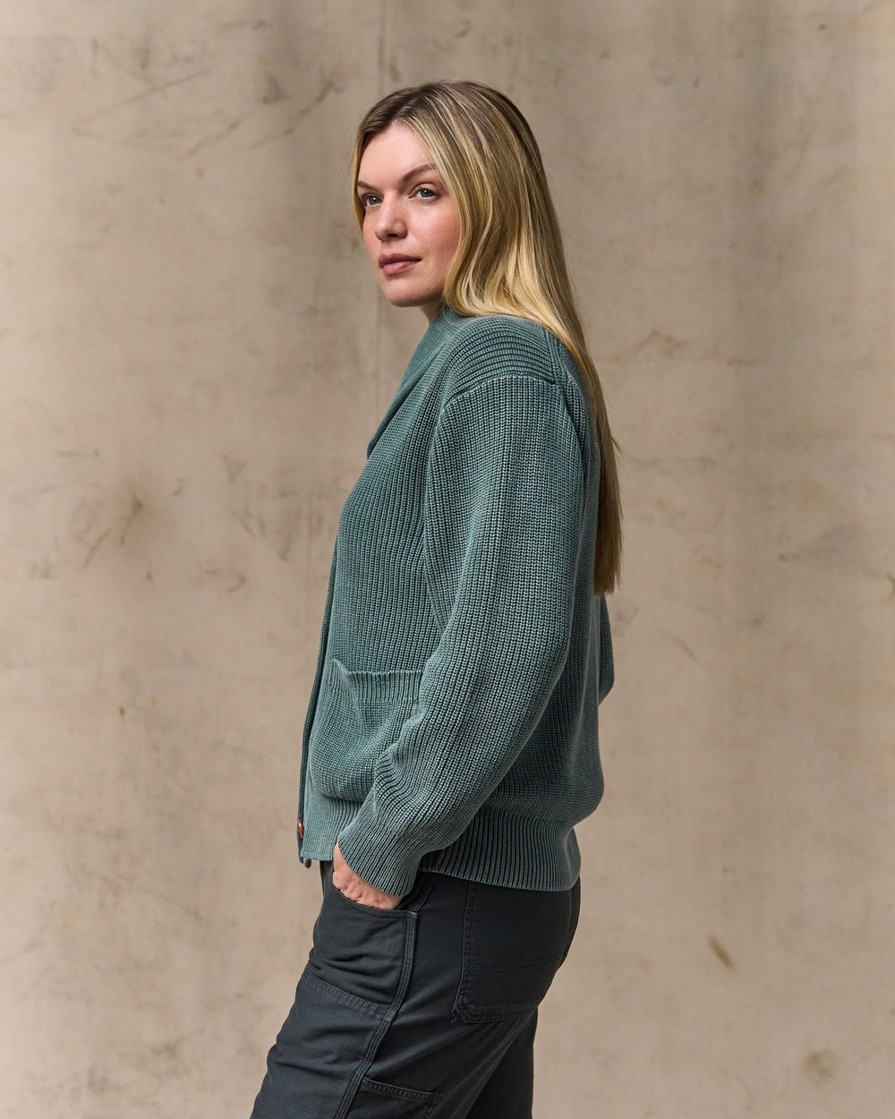 image of a model wearing Filson's Women's Cotton Shawl Neck Cardigan - Juniper