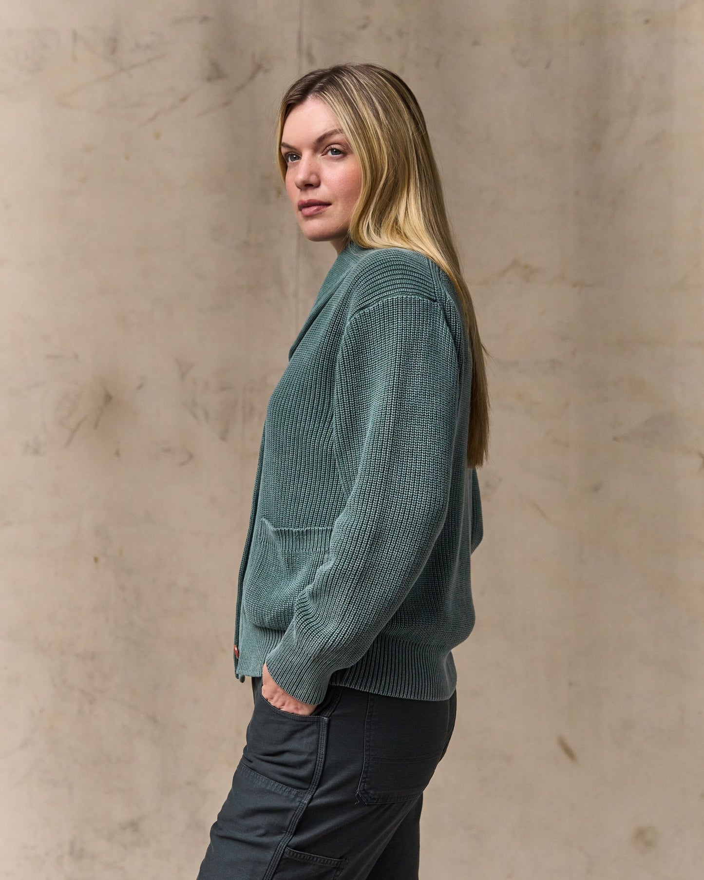 image of a model wearing Filson's Women's Cotton Shawl Neck Cardigan - Juniper