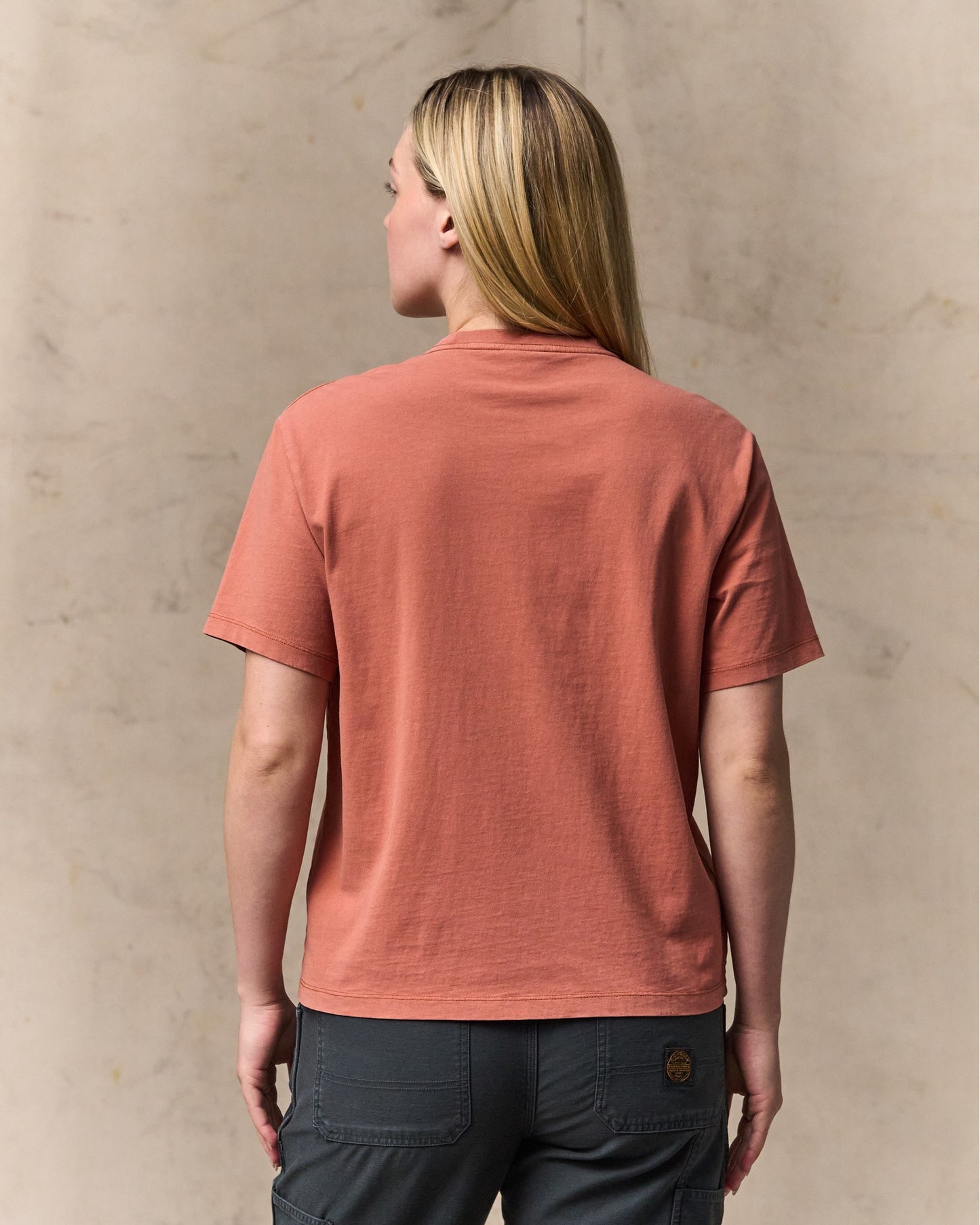 image of a model wearing Filson's Women's Short Sleeve Pocket Tee - Copper Brown