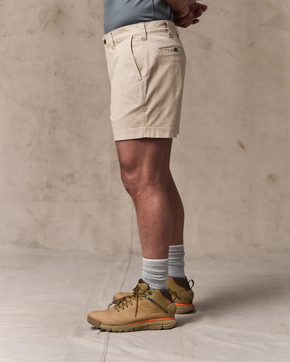 image of a model wearing Filson's Granite Mountain 6" Shorts - Buck Tan