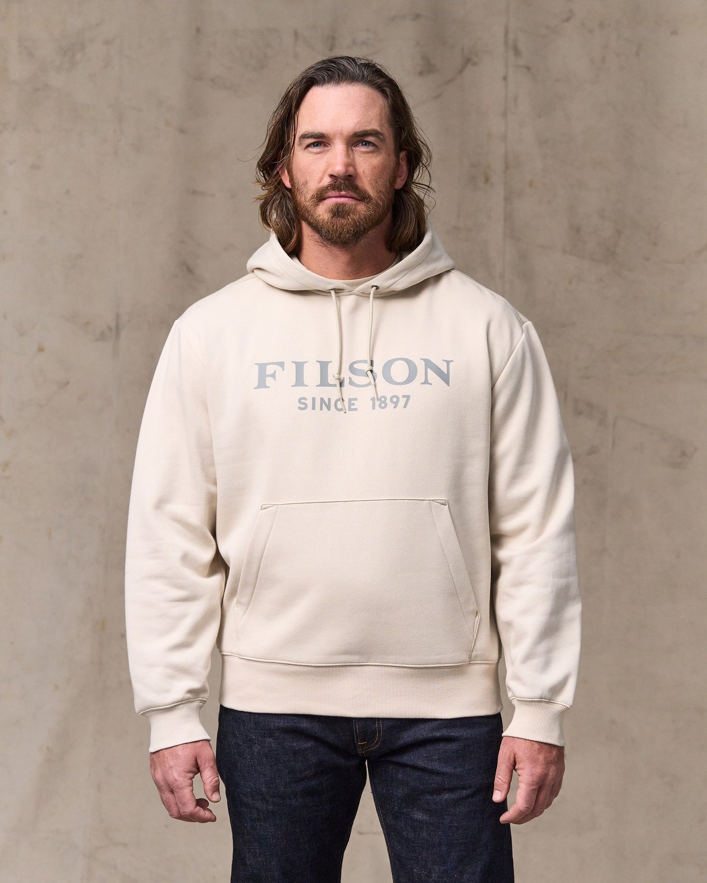 image of a model wearing Filson's Filson Graphic Hoodie - Oatmeal|Model is 6'1" wearing a size medium