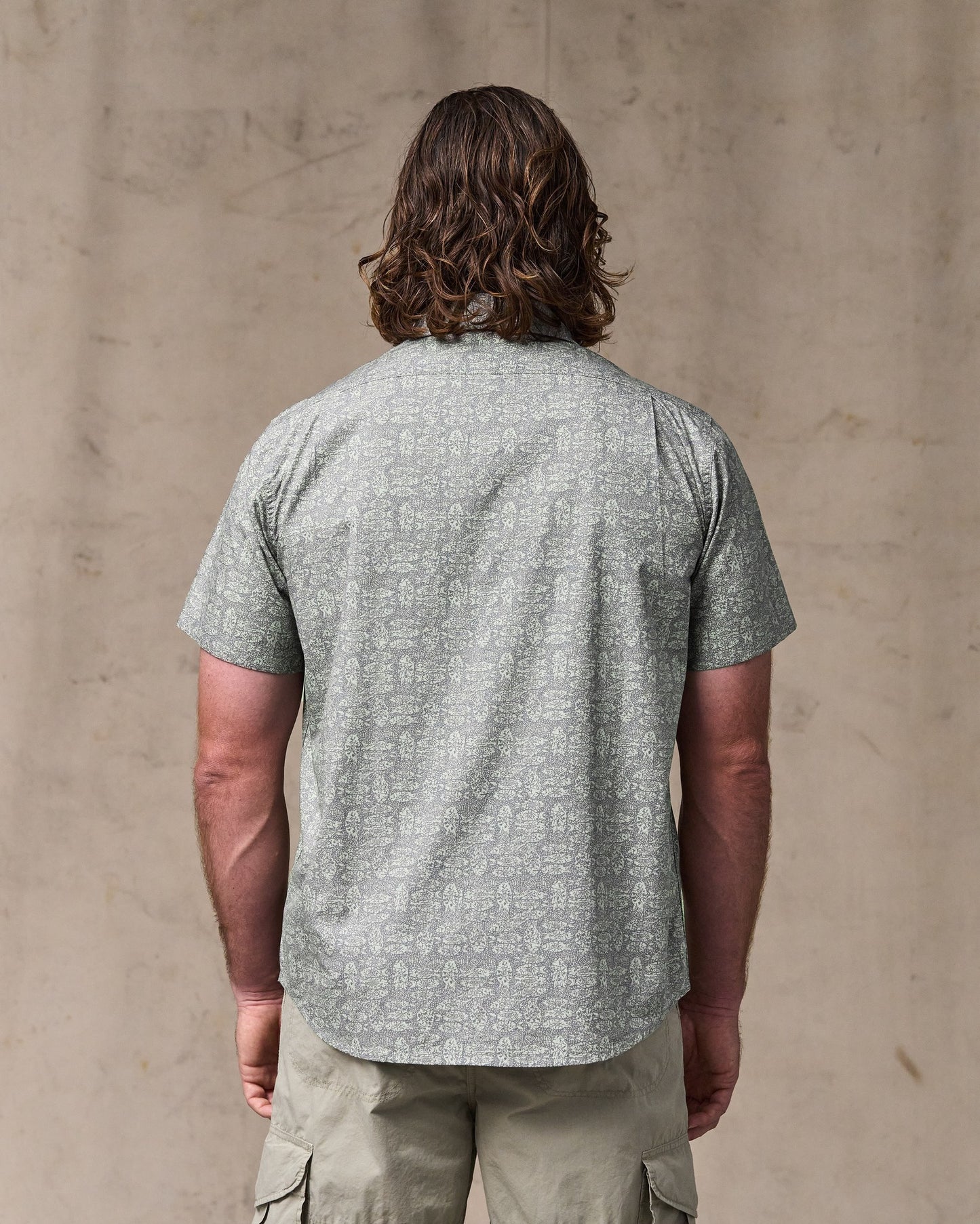 image of a model wearing Filson's Filson's Washed Short Sleeve Feather Cloth Shirt - Khaki / Print