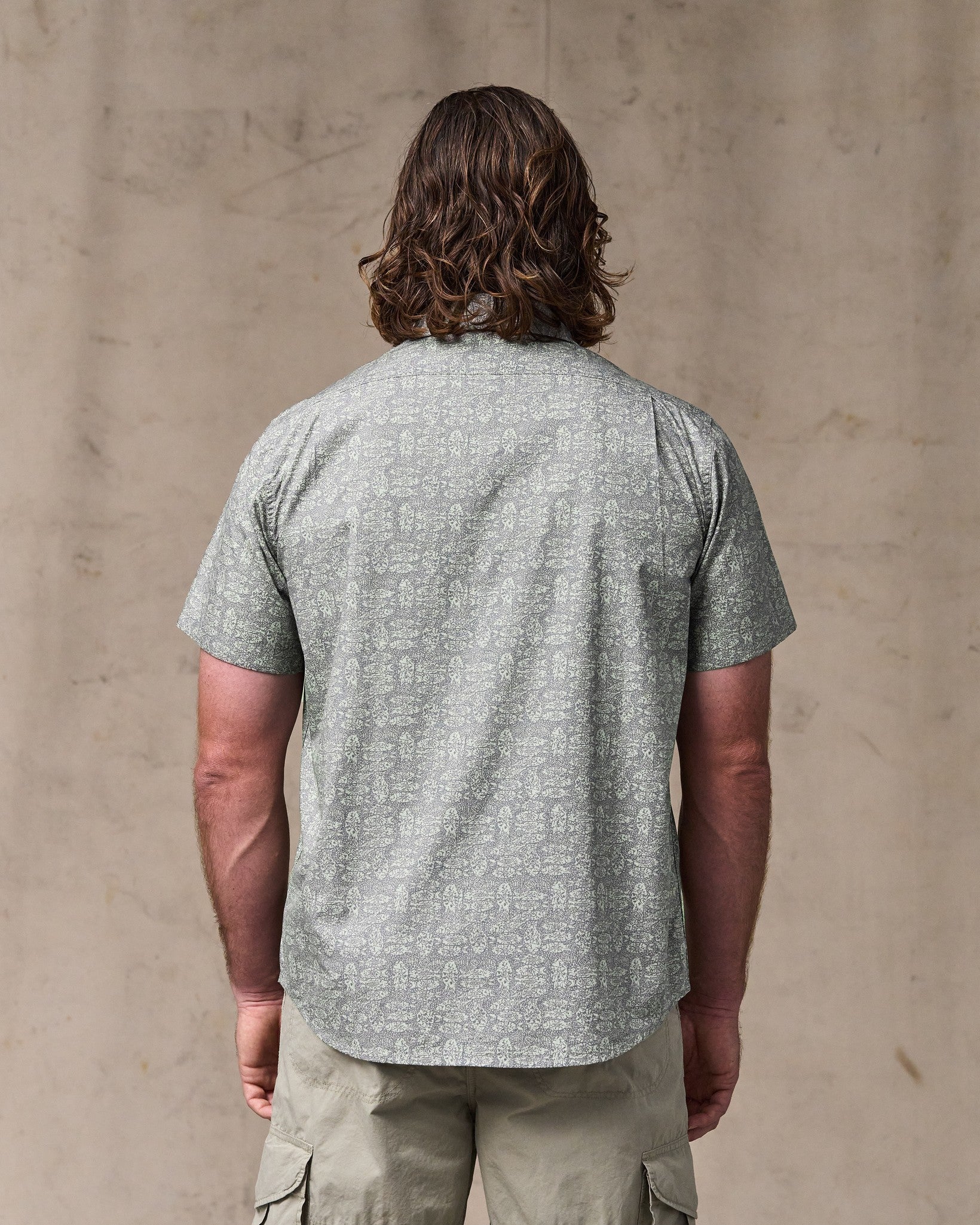 image of a model wearing Filson's Filson's Washed Short Sleeve Feather Cloth Shirt - Khaki / Print