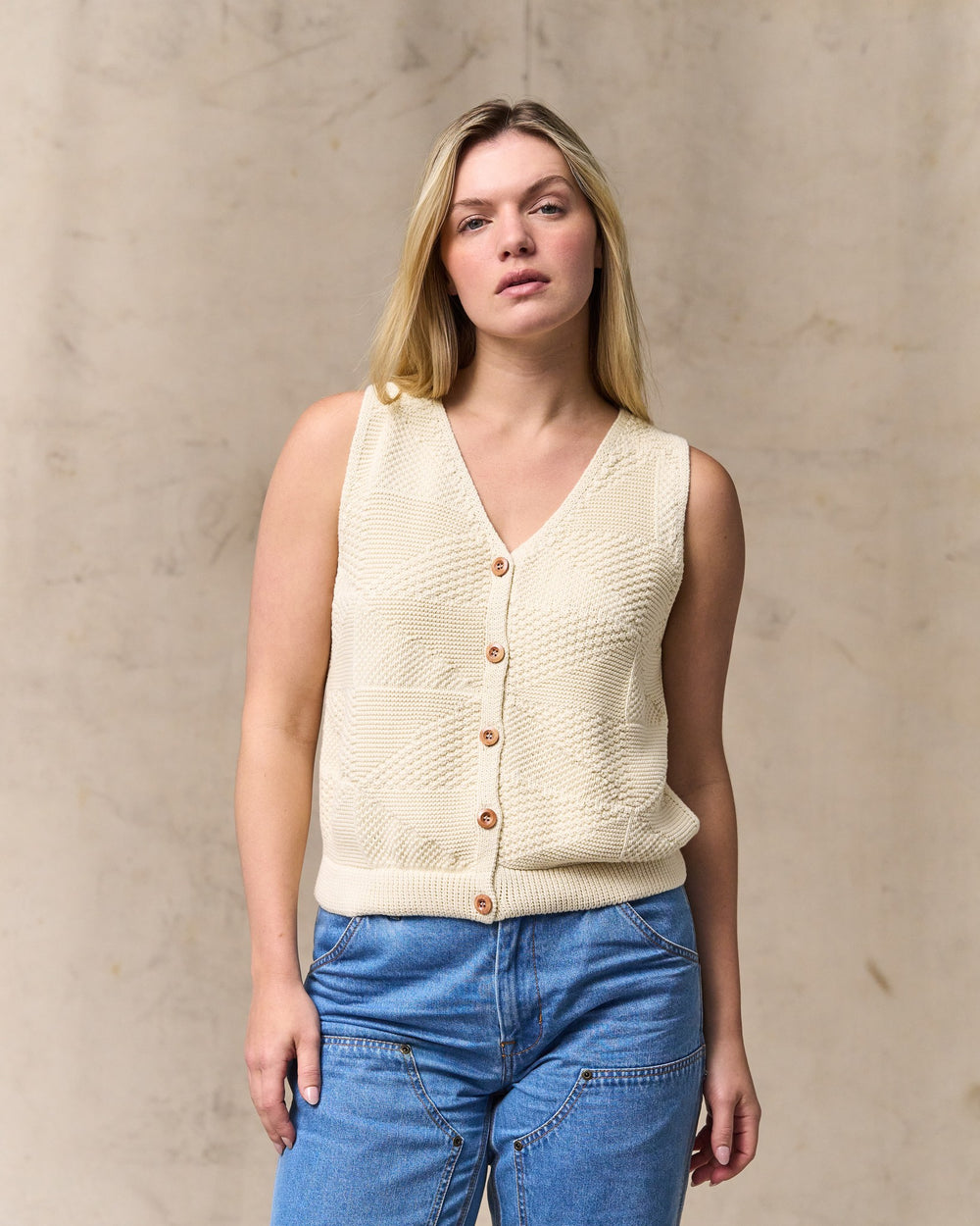 image of a model wearing Filson's Women's Cotton Sweater Vest - Ivory