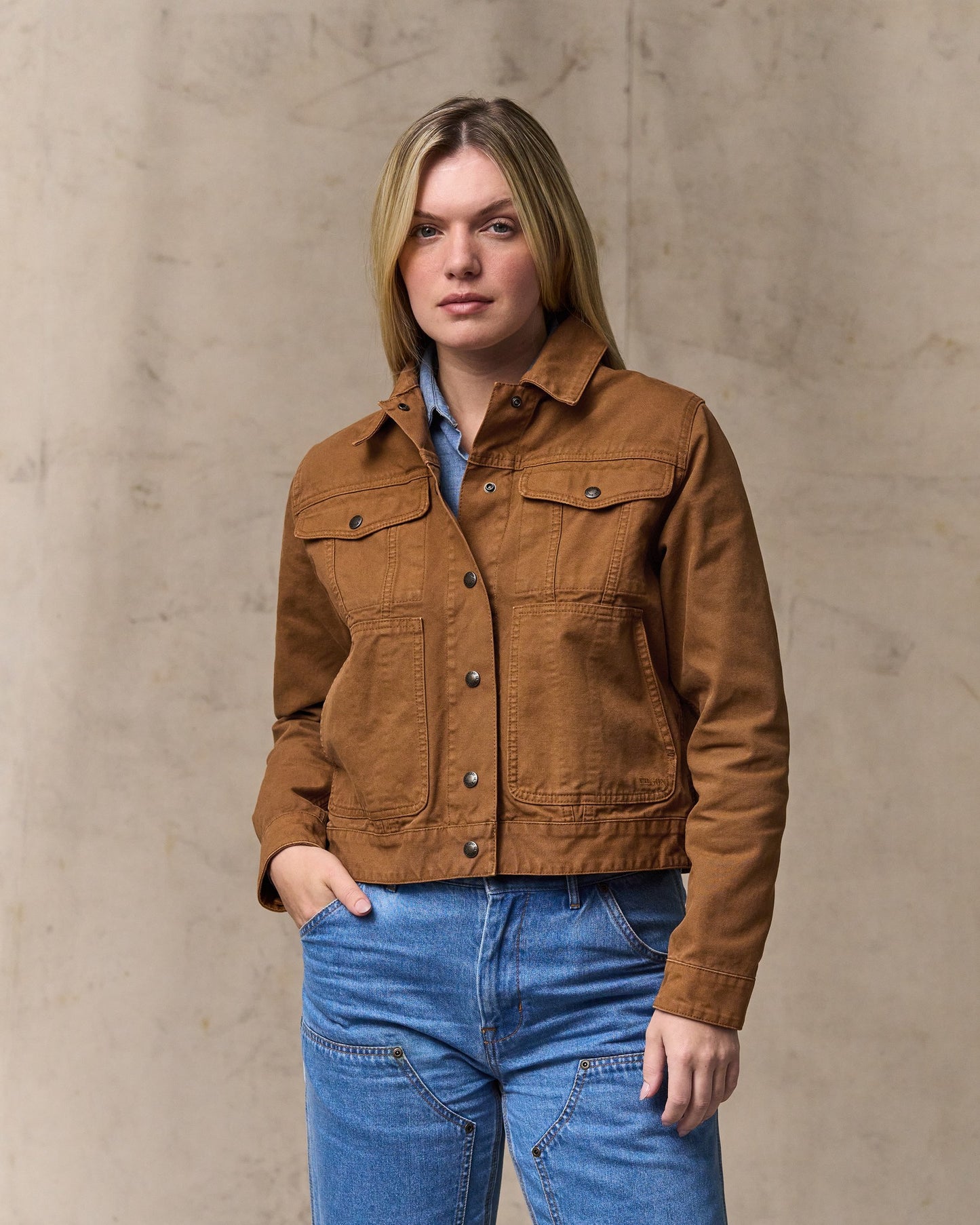 image of a model wearing Filson's Women's Canvas Short Cruiser Jacket - Harvest Tan|Model is 5'10" wearing a size medium