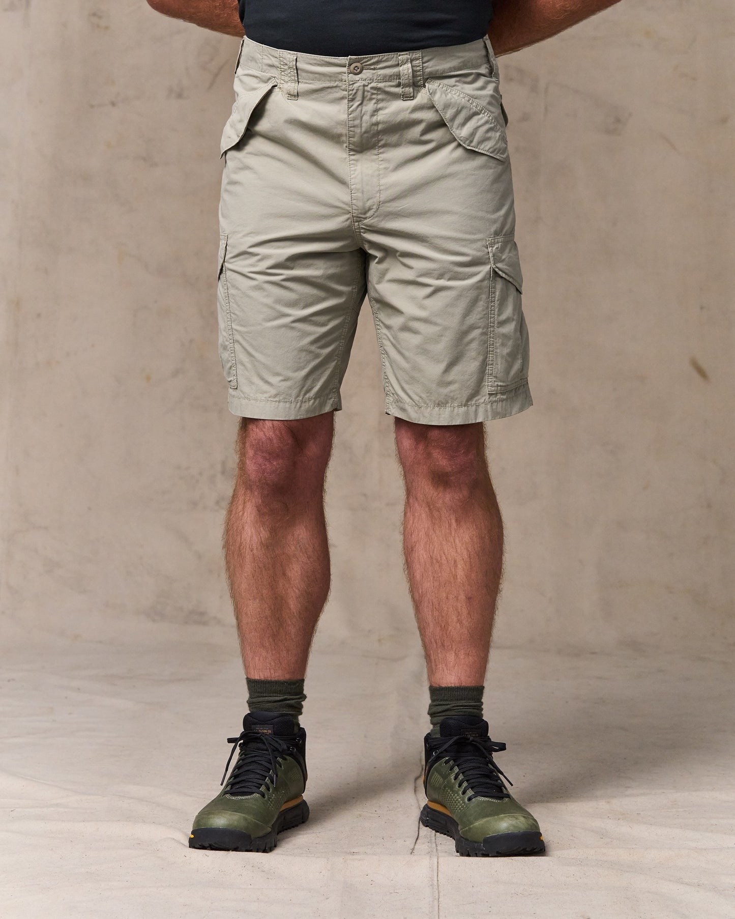 image of a model wearing Filson's Tropical Poplin Cargo Short - Dried Sage|Model is 6'1" wearing a size 34”