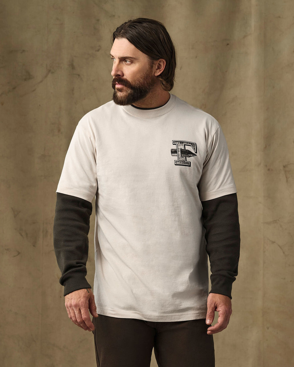 image of a model wearing Filson's Axe Graphic T-Shirt - Natural