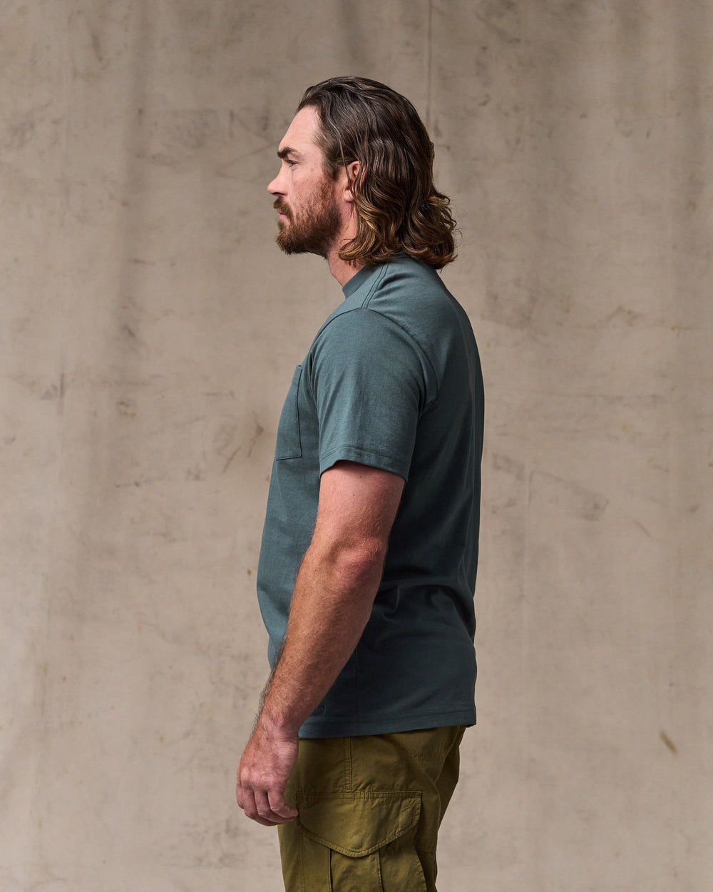 image of a model wearing Filson's Outfitter Pocket T-shirt - Dark Slate