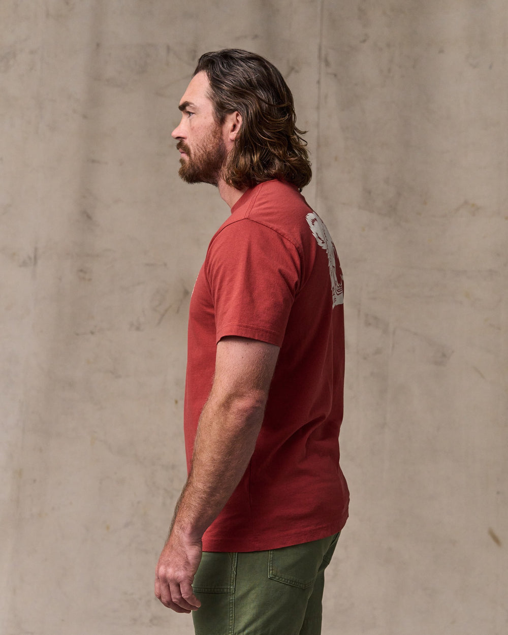 image of a model wearing Filson's Bear Graphic T-shirt - Chili Oil