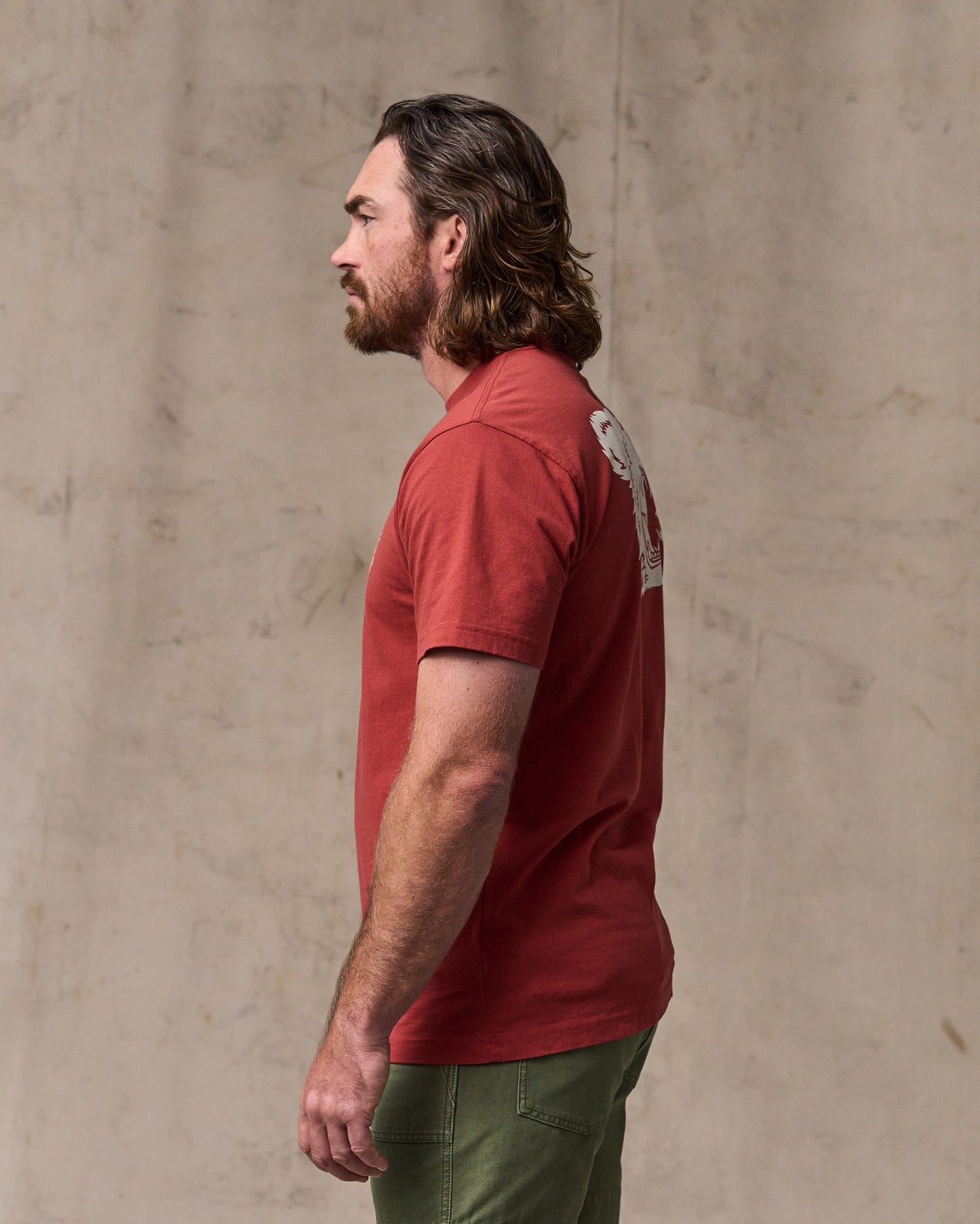 image of a model wearing Filson's Bear Graphic T-shirt - Chili Oil