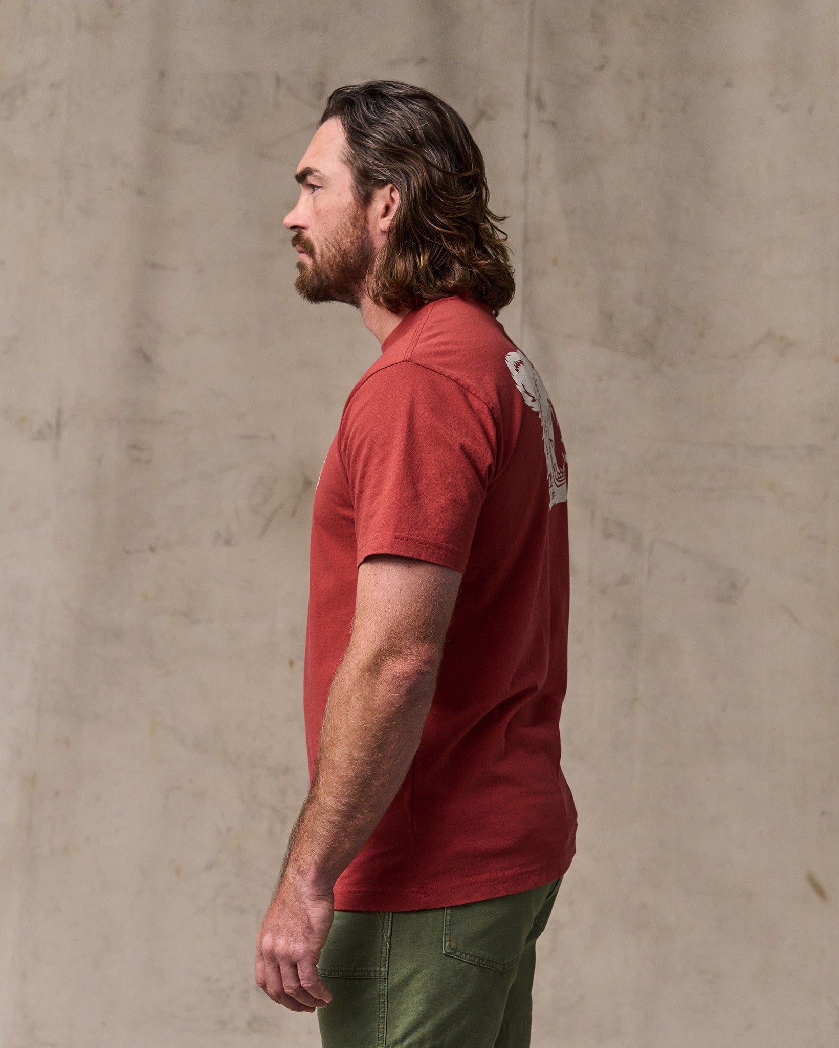 image of a model wearing Filson's Bear Graphic T-shirt - Chili Oil