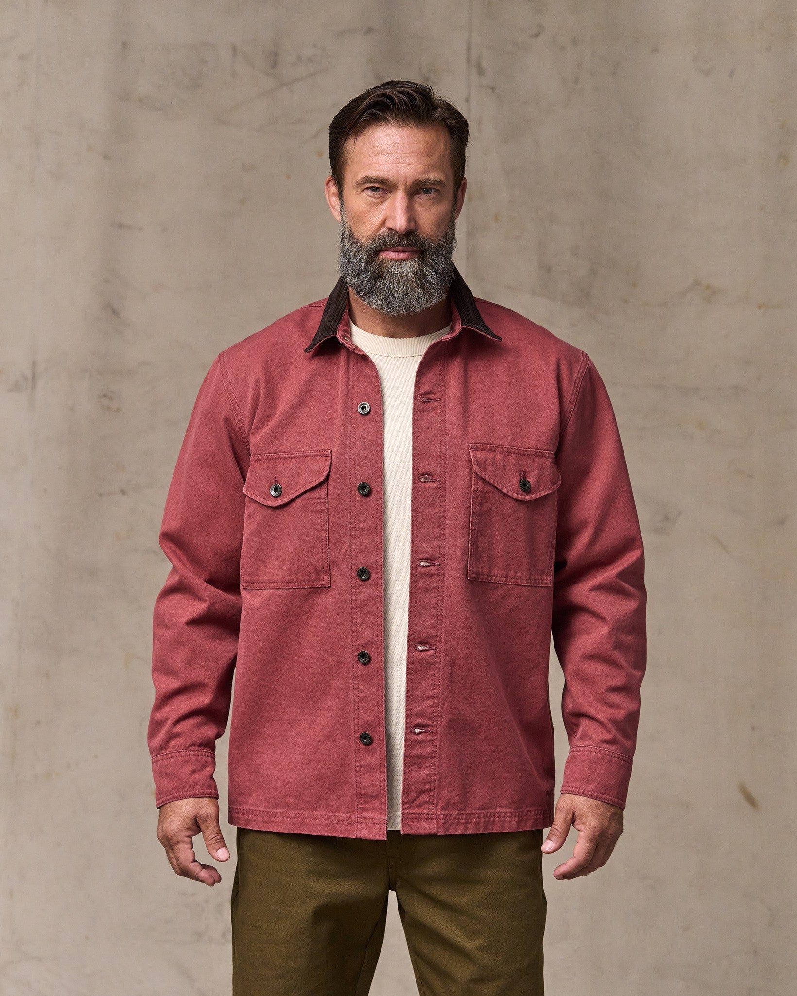 image of a model wearing Filson's Rustic Canvas Jac-shirt - Red Rock